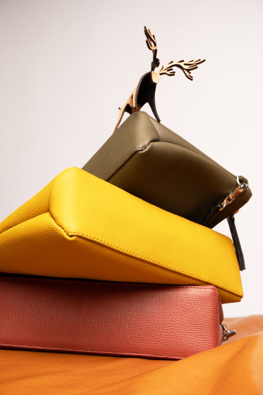 Stacked leather clutches