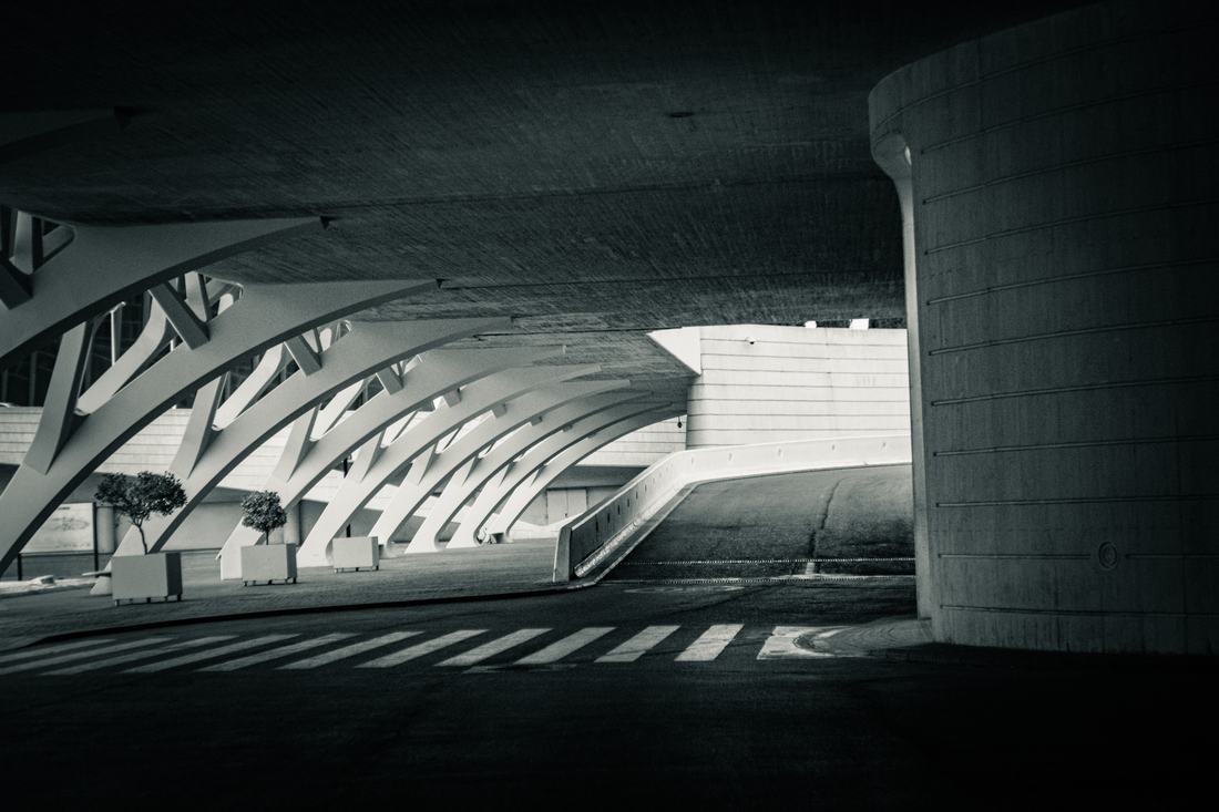 Empty ribbed concrete canopy over a walkway